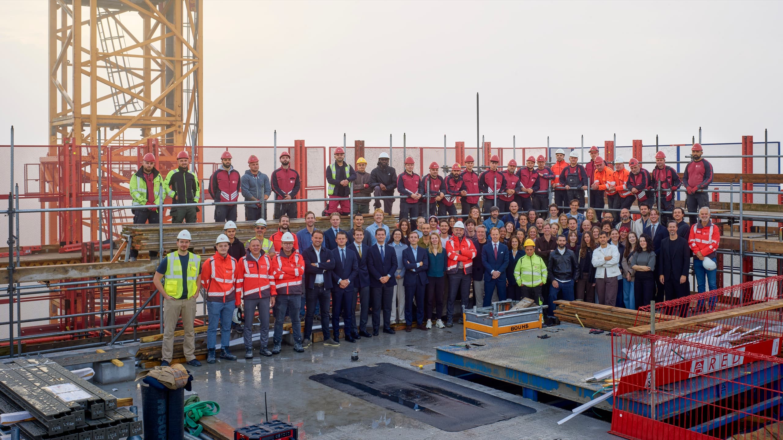 The RED Company team and construction crew on top of The BaanTower