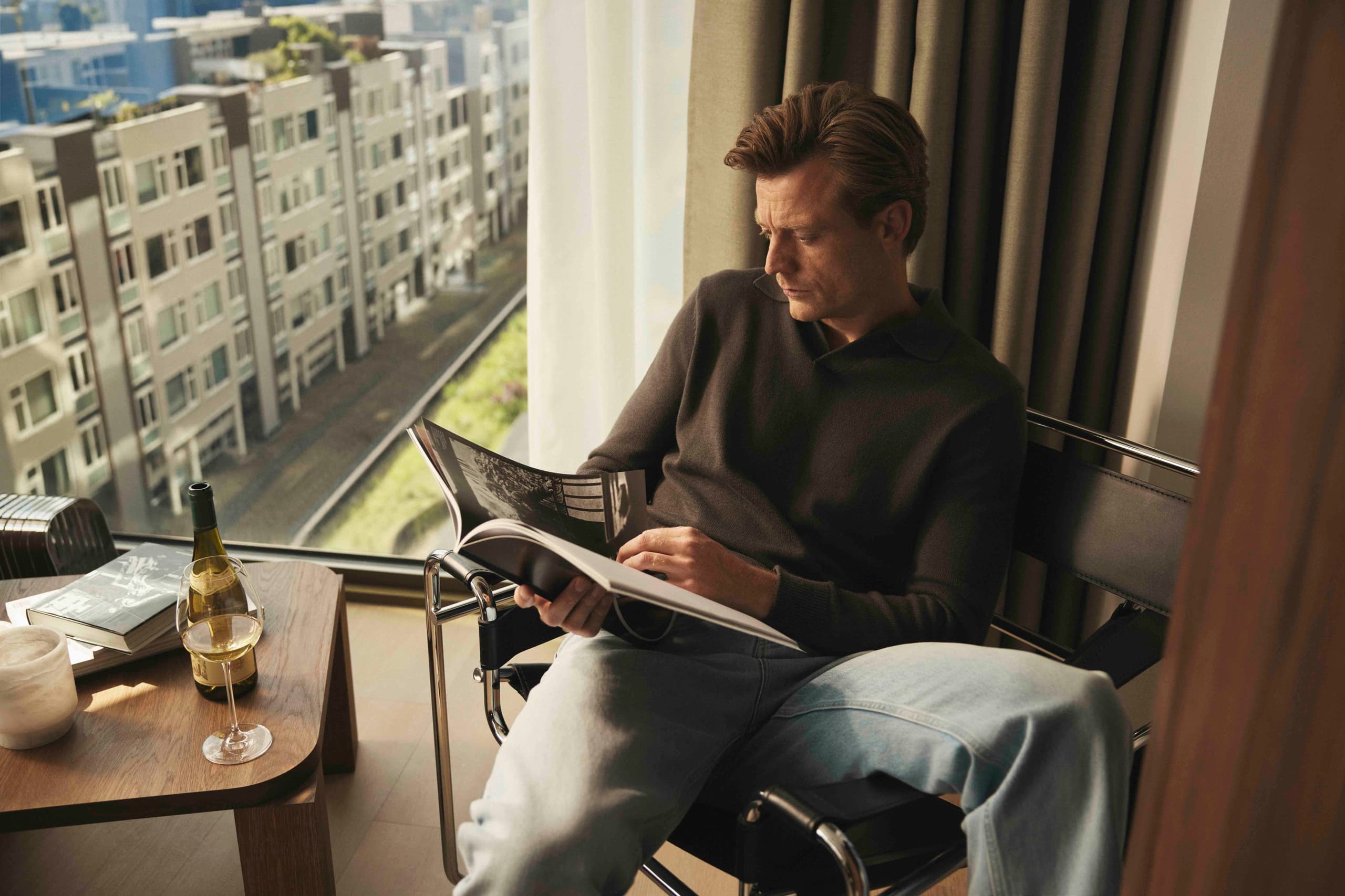 A resident reading by the window
