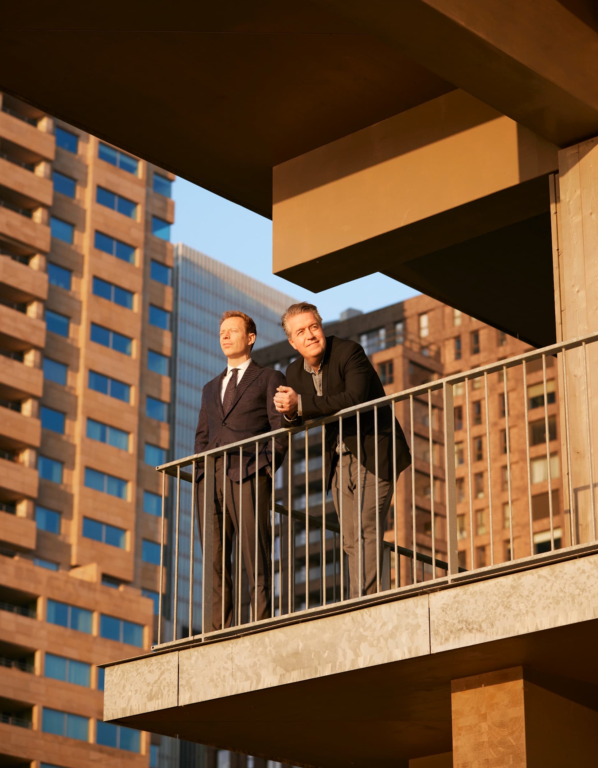 Nanne de Ru and Niels Jansen on a balcony of The BaanTower